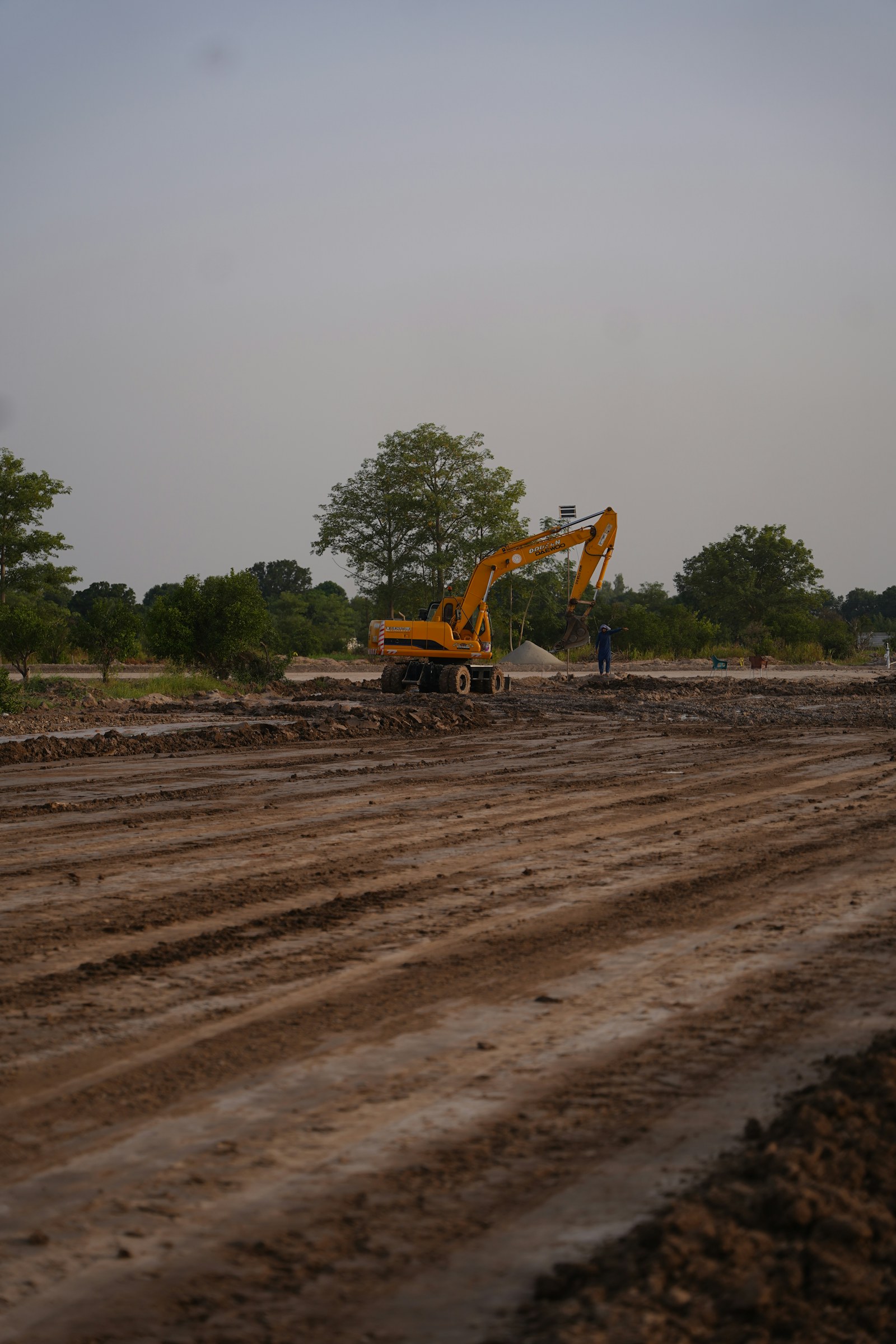 Heavy earth-moving machinery at a construction site